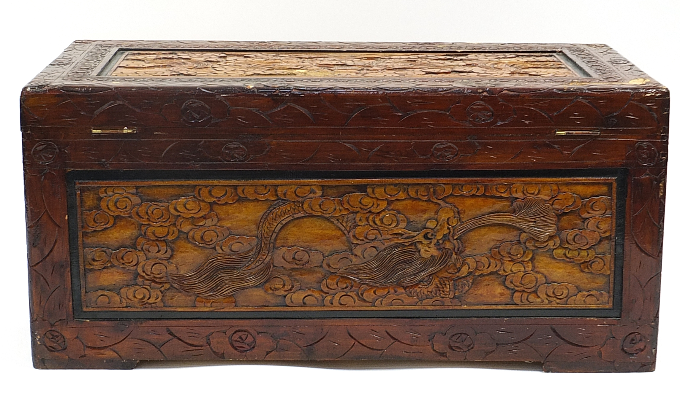 Chinese camphor wood trunk carved with dragons amongst clouds, 46cm H x 101cm W x 53cm D - Image 3 of 3