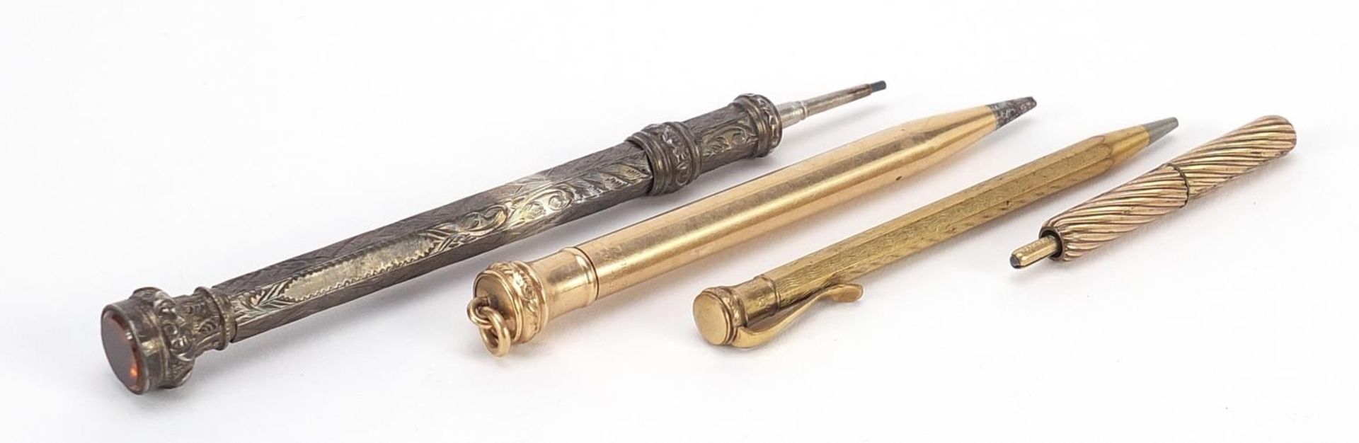 Propelling pencils including a large silver example with citrine top end, the largest 10.5cm in - Image 2 of 3