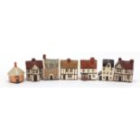 Seven Mudlen End Studio miniature cottages, the largest 9cm high