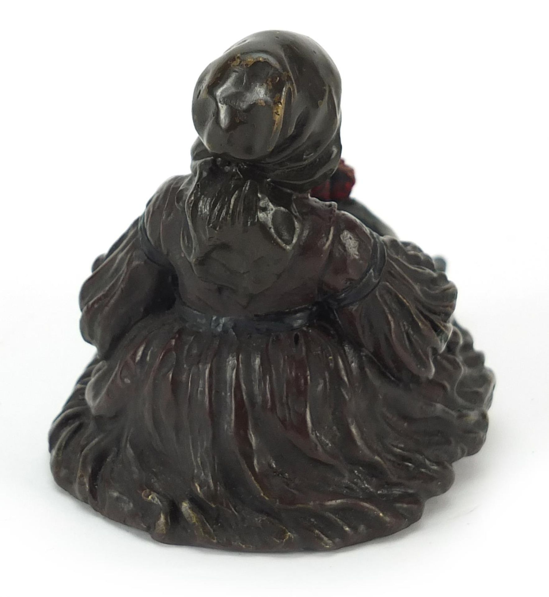 Cold painted bronze erotic figurine seated in a dress, 11cm in length - Image 2 of 3