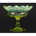 Art Nouveau Vaseline glass pedestal bowl with frilled rim, 12.5cm high x 15cm in diameter