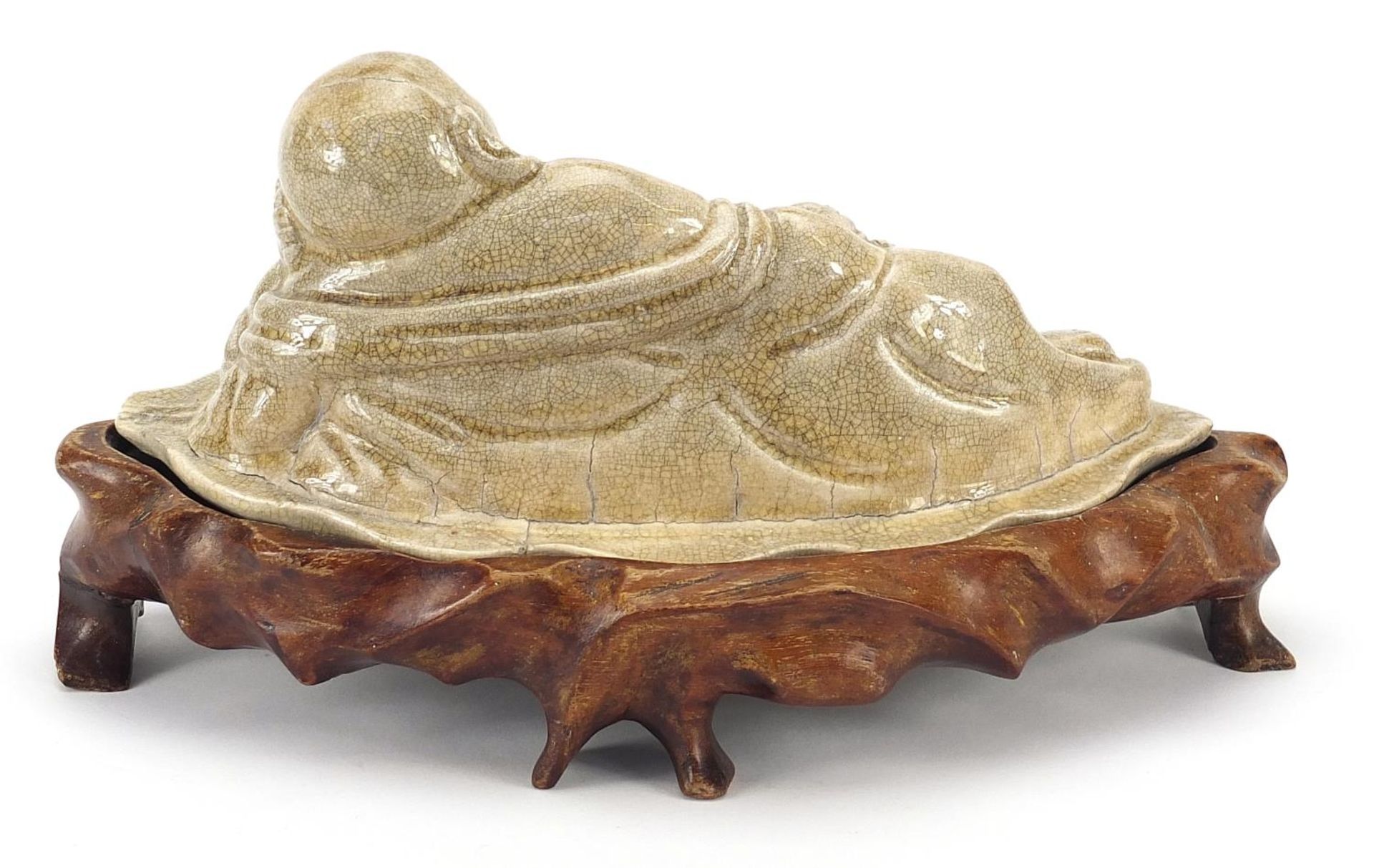 Chinese pottery figure of Buddha on a lotus flower having a grey crackle glaze, raised on a carved - Image 2 of 3