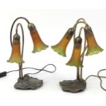 Two Tiffany design bronzed lily pad lamps with glass shades, 40cm high