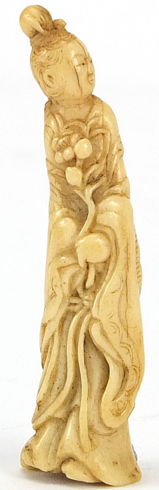 Chinese ivory carving of a female holding a sprig, 7cm high