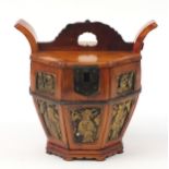 Chinese wooden food carrier carved with figures, 31cm high