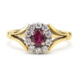 Unmarked gold ruby and diamond cluster ring housed in a Bruford Eastbourne-Exeter box, size R/S, 5.