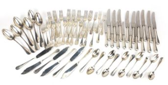 German silver cutlery including tablespoons, knives with steel blades, forks and teaspoons, the