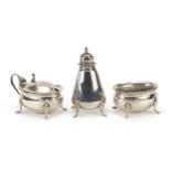 Chinese silver three piece cruet marked Sterling, Made in Hong Kong, the largest 7.5cm high,