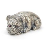 Silver English Bulldog paperweight with ruby eyes, impressed Russian marks to the base, 6.5cm