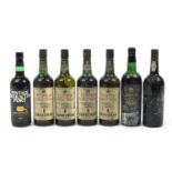 Seven bottles of vintage port to include 1960 Dow's and five bottles of Sandeman Clipper white port