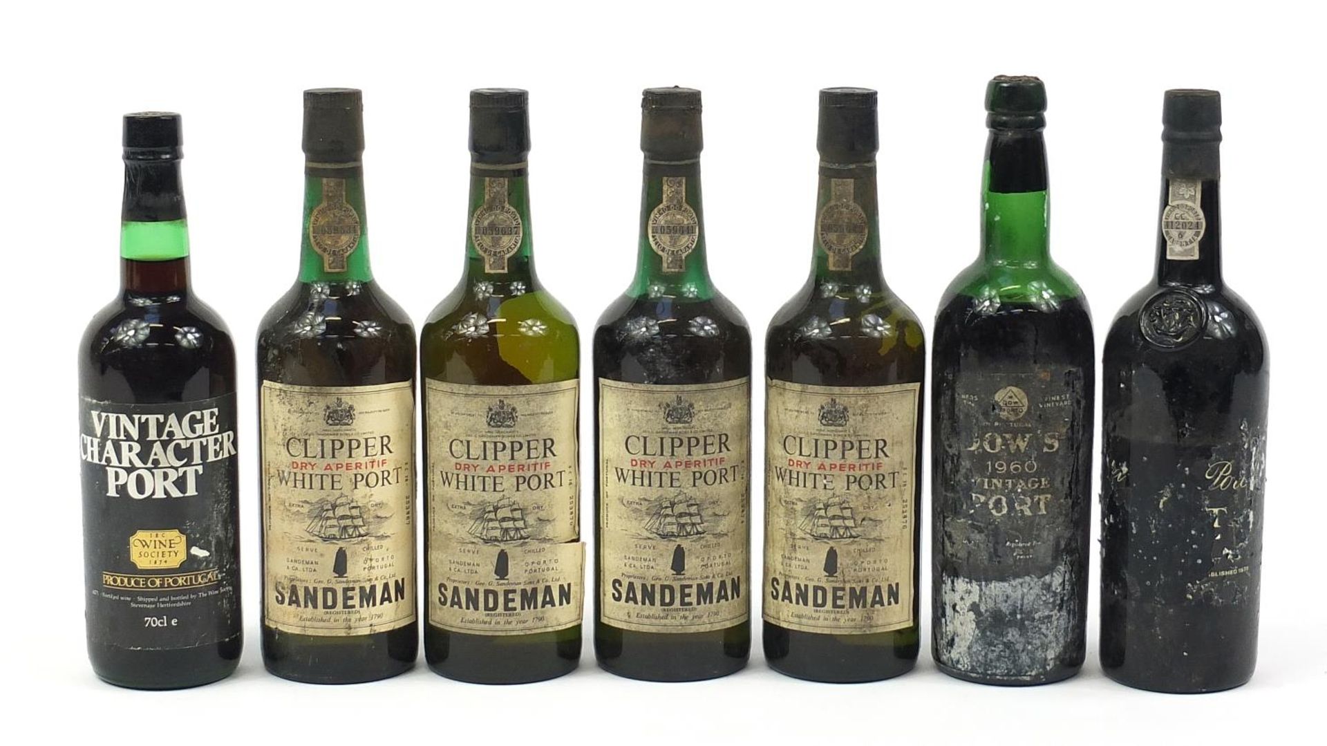 Seven bottles of vintage port to include 1960 Dow's and five bottles of Sandeman Clipper white port