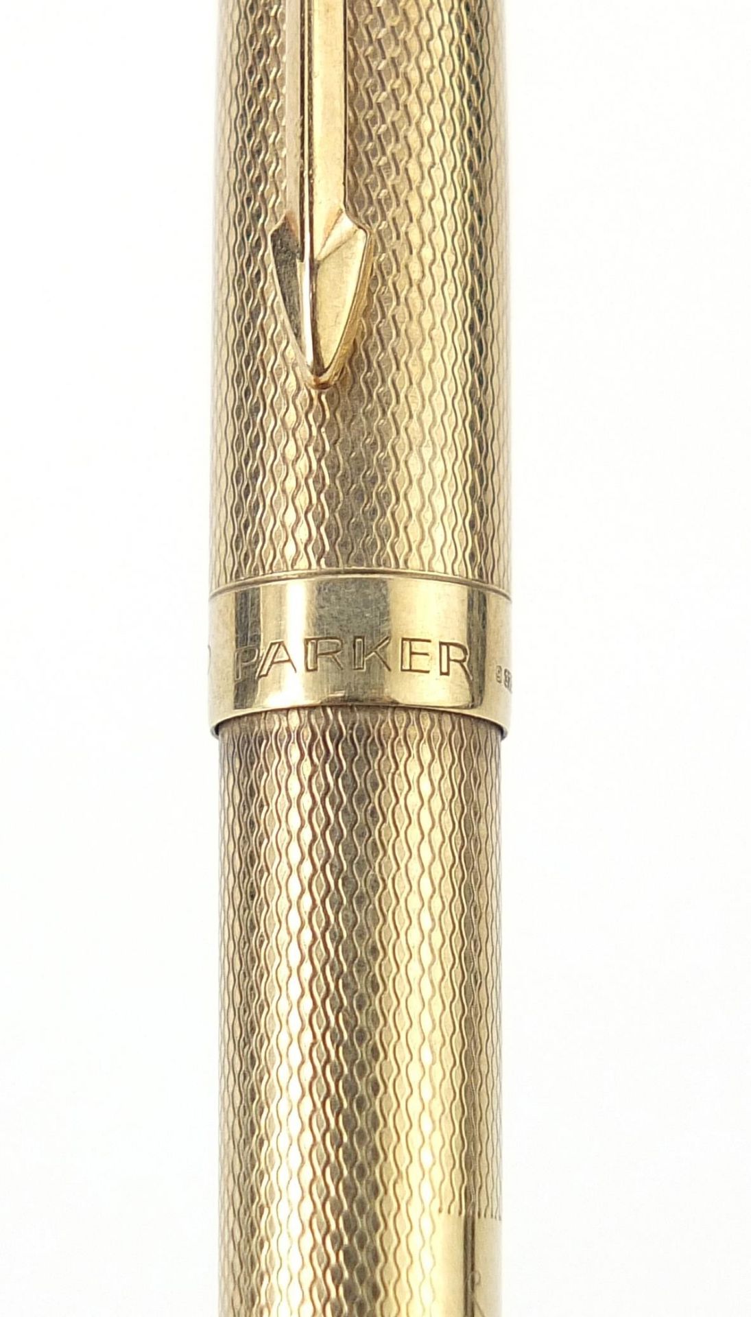 Parker, 9ct gold cased Biro pen with engine turned body, 12.8cm in length, 18.5g - Image 4 of 5