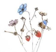Sarah Jones, four contemporary 1980's silver and enamel flowers, including a bluebell and