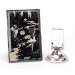 Rectangular silver framed butterfly wing picture of fairies and a circular silver desk photo