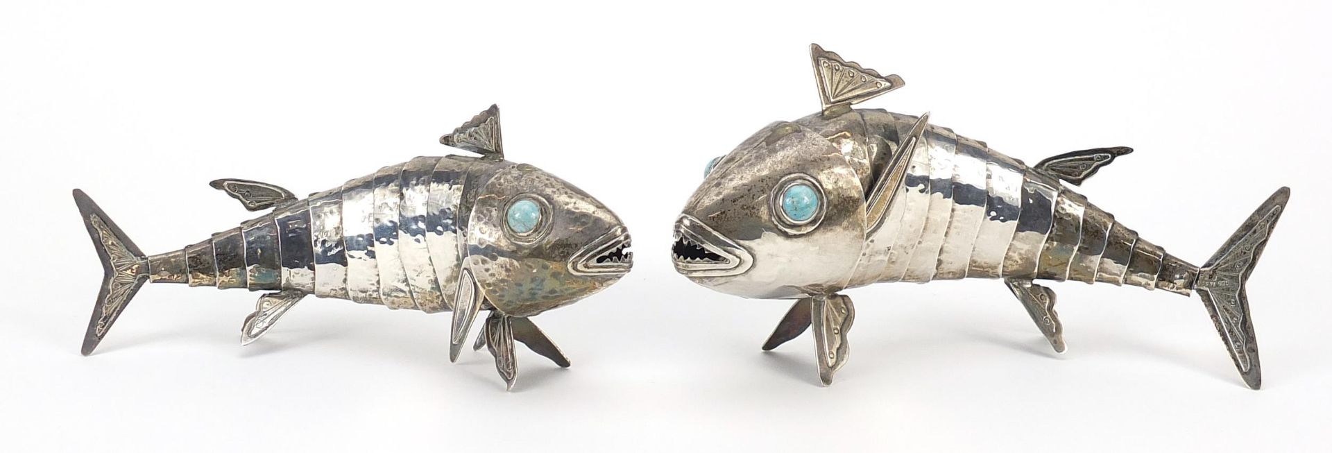 Graziella Laffi, two Peruvian articulated silver fish with turquoise eyes, 19cm and 17cm in