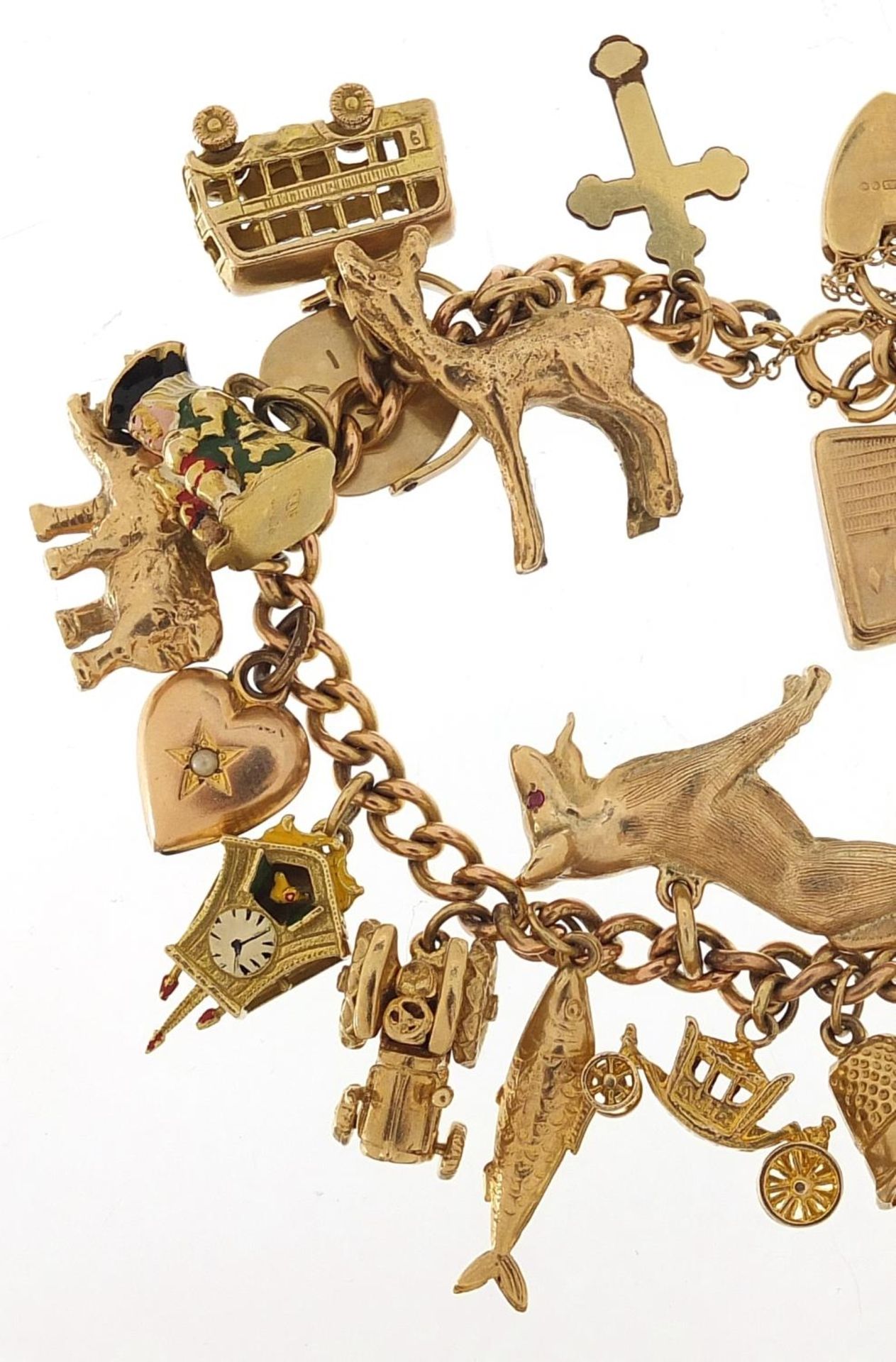 9ct gold charm bracelet with a large selection of mostly 9ct gold charms including Alsatian dog, - Image 2 of 7