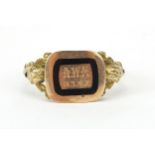 Antique unmarked gold and black enamel mourning ring, inscribed A W M 14.3.1917 and partially