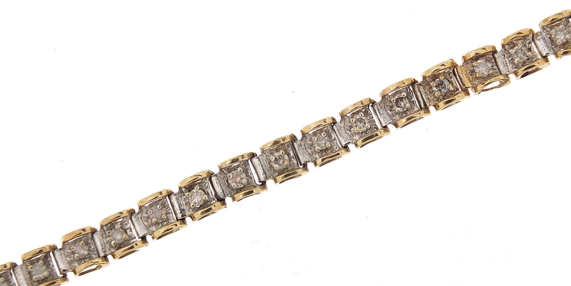 9ct gold diamond line bracelet, 18.5cm in length, 7.3g