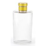 Art Deco cut glass scent bottle with silver gilt and yellow guilloche enamel lid, 11.5cm high