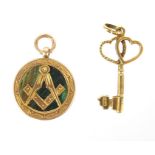 9ct gold hardstone masonic pendant and a 9ct gold love heart key pendant, 2.5cm and 2cm high,