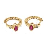 Pair of 14ct gold ruby and diamond hoop earrings pierced with love hearts, 1.7cm in diameter, 3.1g