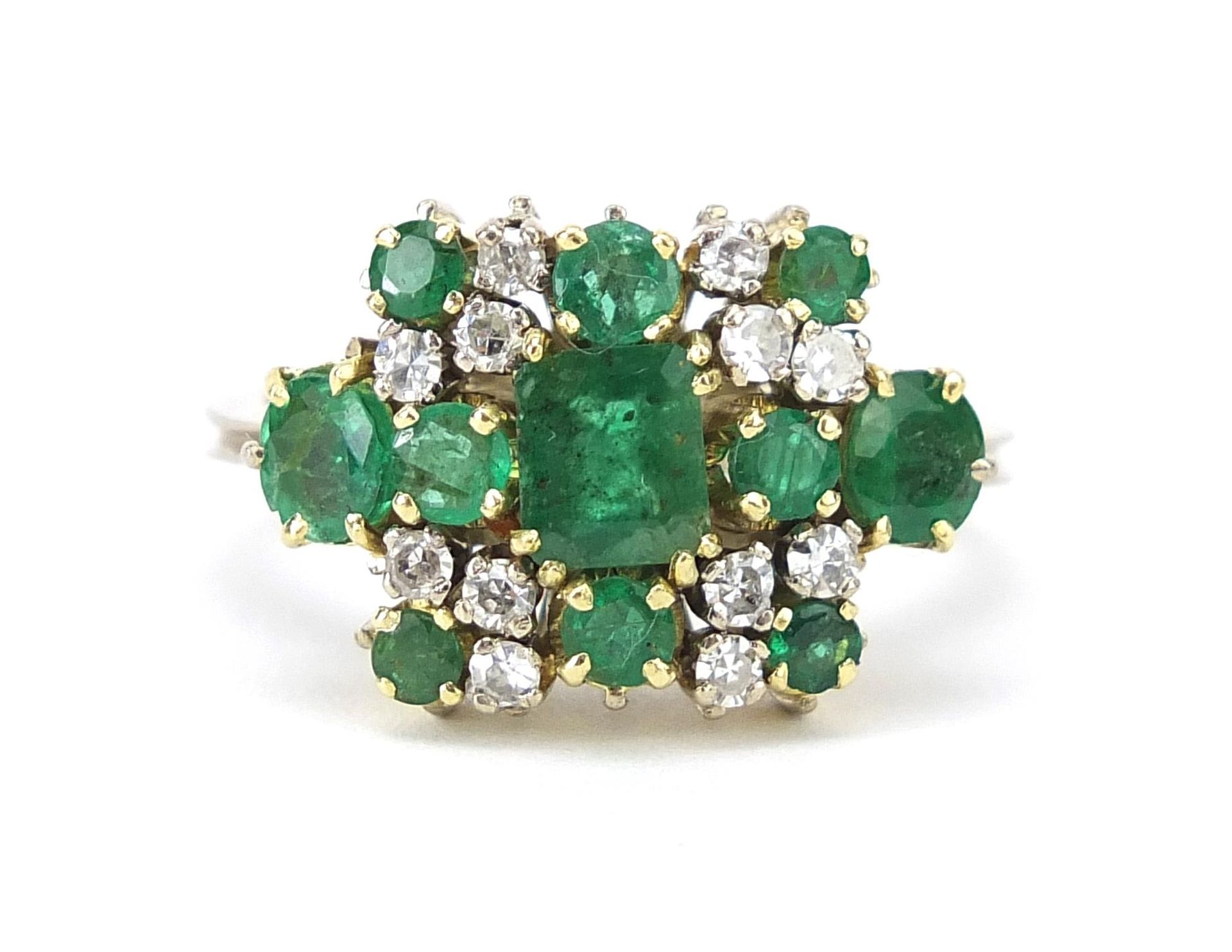 Unmarked white metal emerald and diamond cluster ring, size M, 6.8g