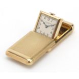 Vertex, Art Deco 9ct gold sliding travel watch with engine turned case, retailed by Birch & Gaydon