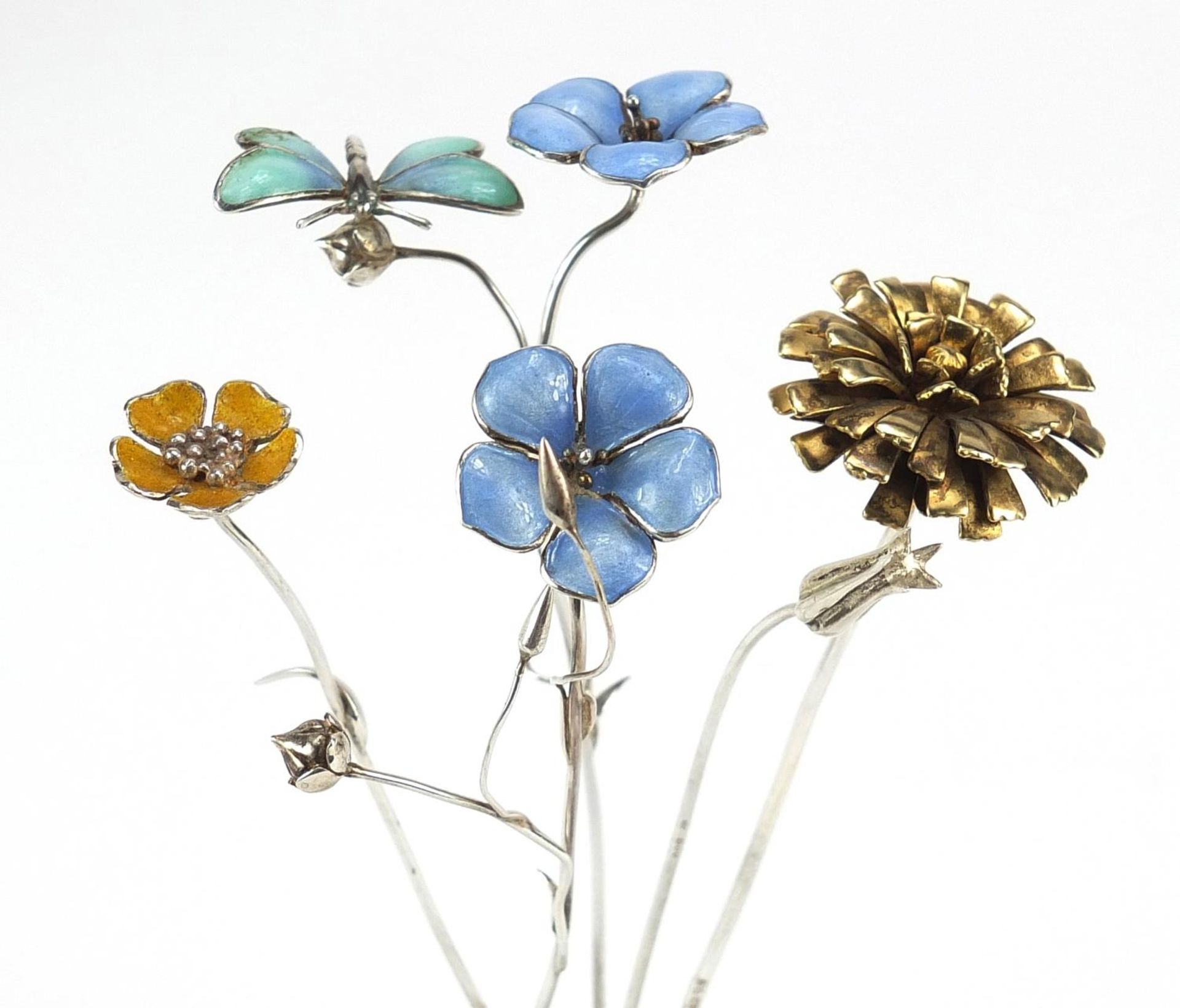 Sarah Jones, five contemporary 1980's silver flowers, three with enamel including one with a