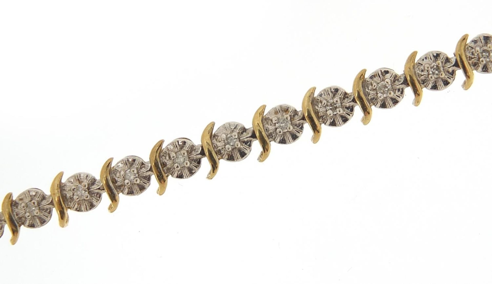 9ct gold diamond line bracelet, 18cm in length, 6.2g