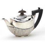 James Deakin & Sons, George V silver demi fluted teapot with ebonised wood handle, Sheffield 1927,