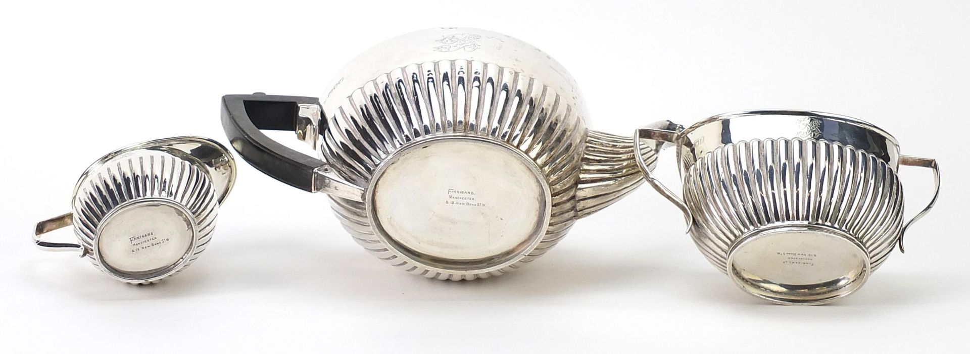 C S Harris & Sons Ltd, Edwardian matched silver three piece demi fluted tea service retailed by - Image 4 of 5