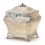 Antique Scottish silver tea caddy embossed with flowers and foliage, indistinct Glasgow hallmarks,