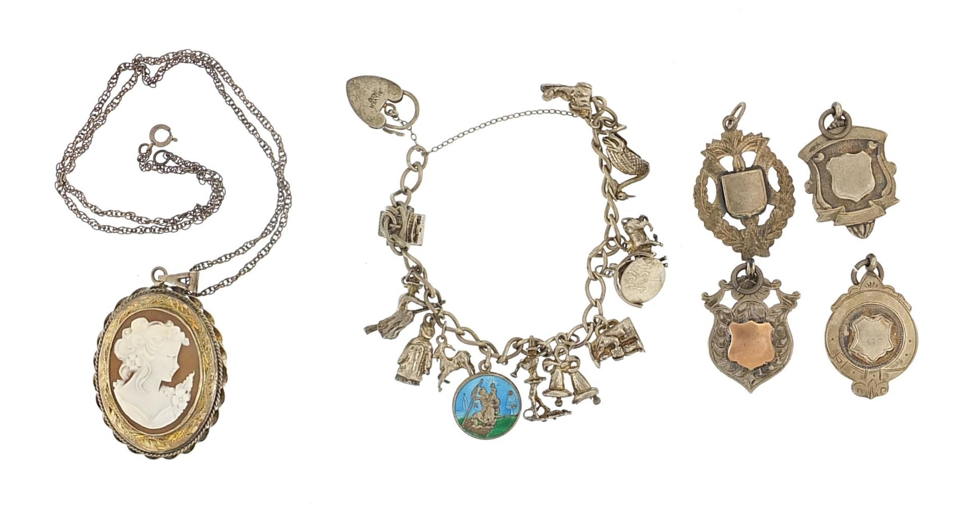Silver jewellery comprising charm bracelet with charms, four sports jewels and large cameo locket on