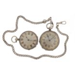 Two ladies silver open face pocket watches with ornate dials and a silver watch chain, 38mm and 40mm