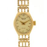 Accurist, ladies 9ct gold Accurist Diamond wristwatch with 9ct gold strap, the case 15mm wide, 12.9g