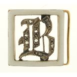 Unmarked gold diamond and white enamel initial 'B' mourning clasp, 1.5cm x 1.4cm, 2.0g