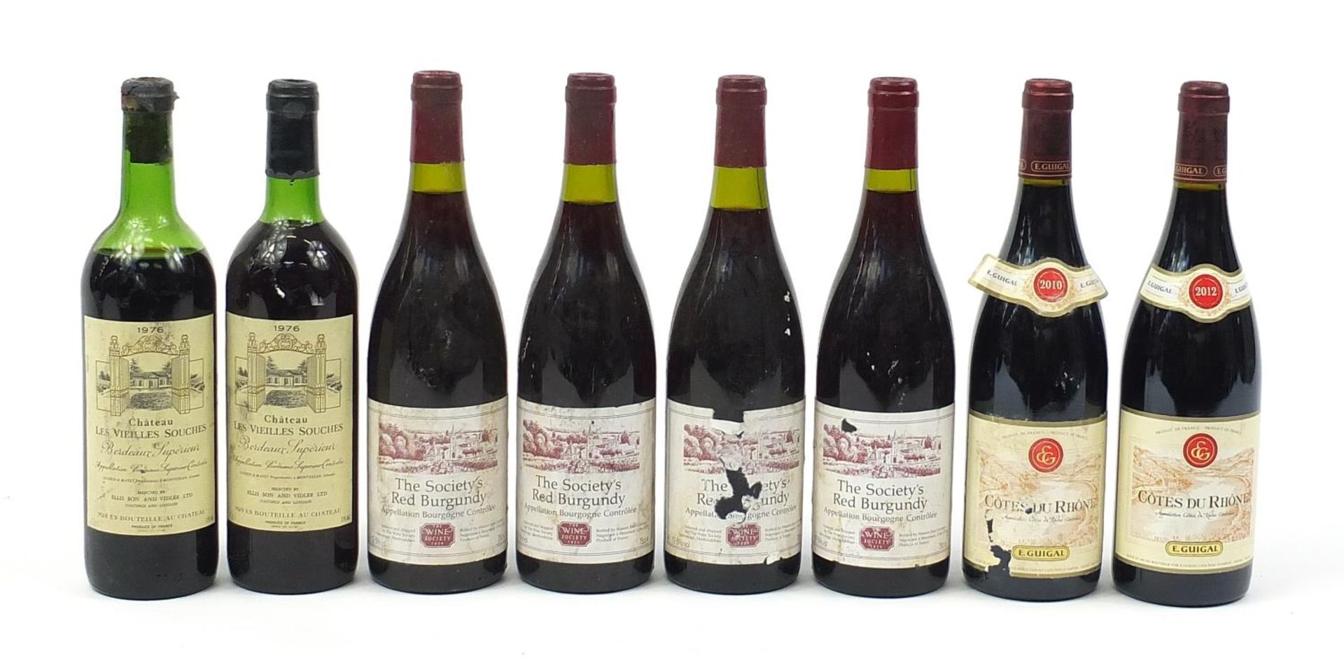 Eight vintage and later bottles of red wine comprising two bottles of 1976 Chateau Les Vieilles