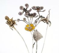 Sarah Jones, four contemporary 1980's silver flowers, two with enamel including a thistle, various
