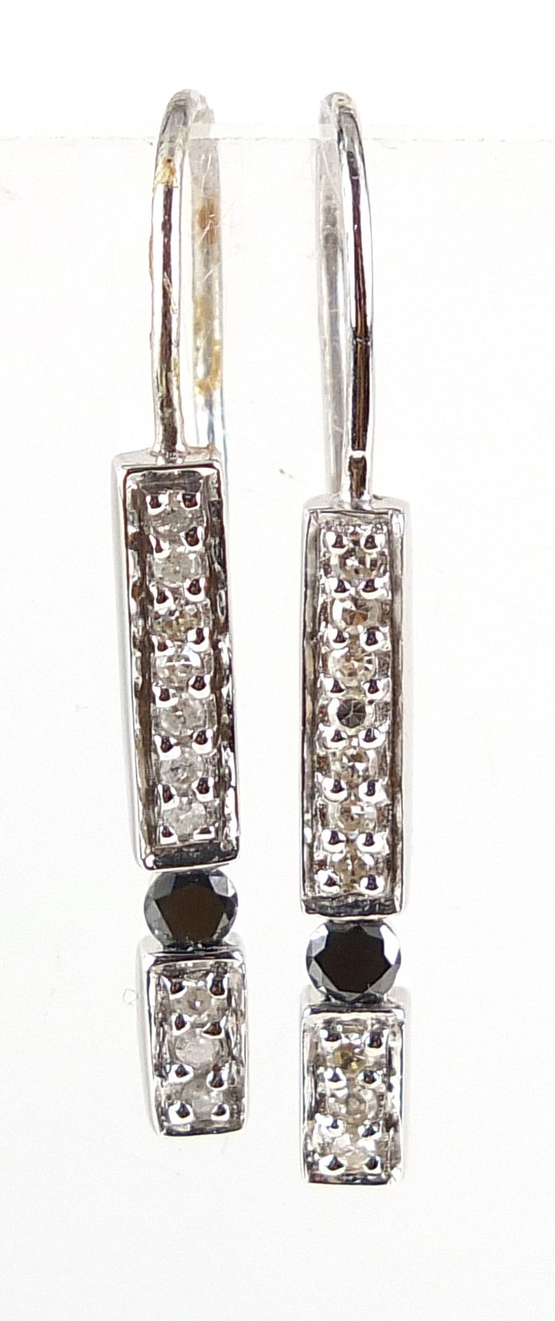 Pair of unmarked white gold white and black diamond drop earrings, 2.9cm high, 1.9g