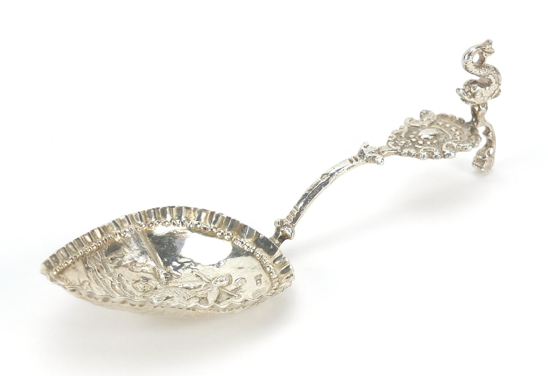 Antique Dutch silver caddy spoon, the bowl embossed with a lady farmer and cattle, indistinct - Image 2 of 4