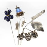 Sarah Jones, four contemporary 1980's silver flowers, two with enamel including blackberries and