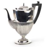 C S Harris & Sons Ltd, Edwardian silver demi fluted coffee pot with ebonised handle, retailed by