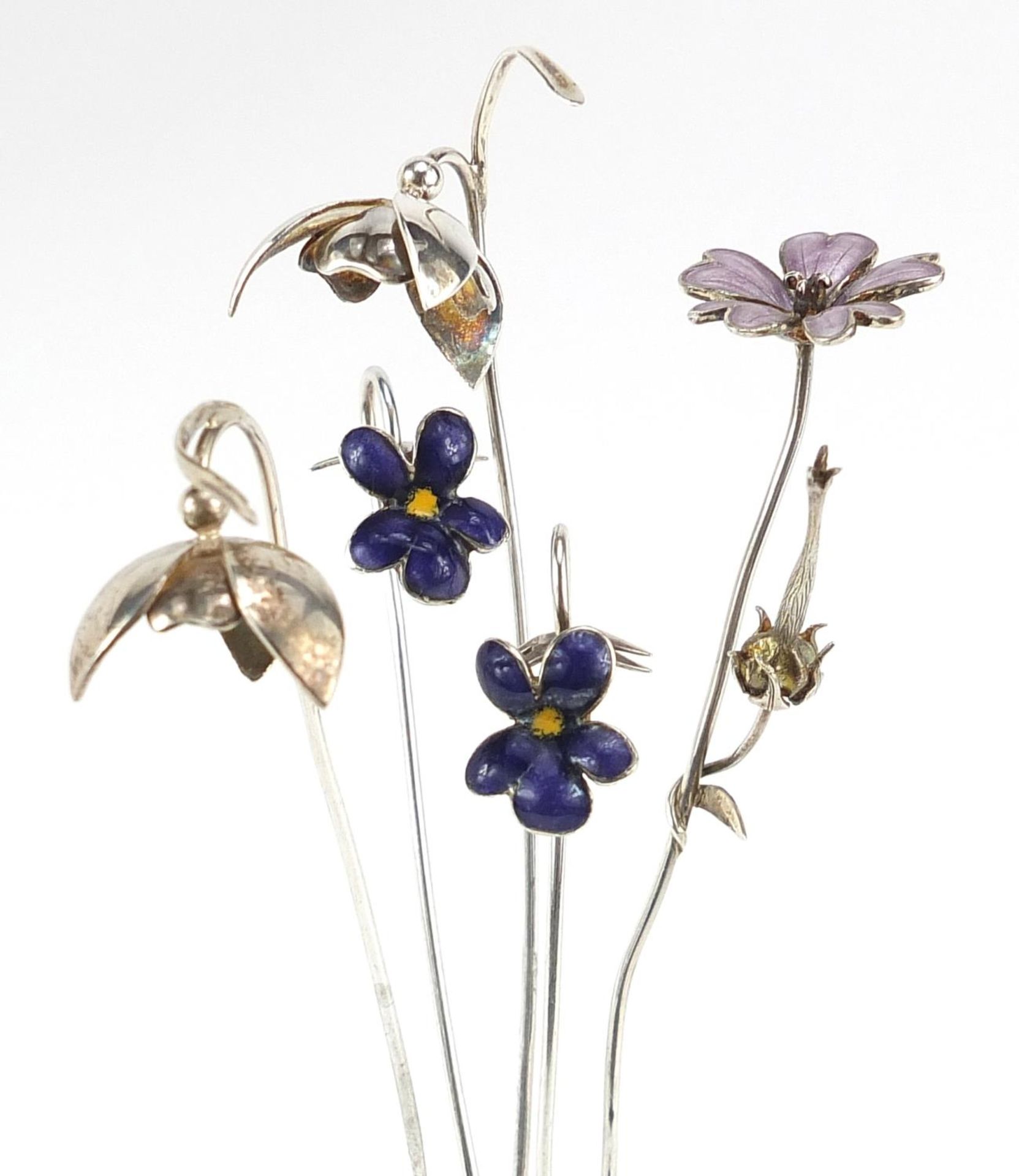 Sarah Jones, five contemporary 1980's silver flowers, three with enamel, various London hallmarks,