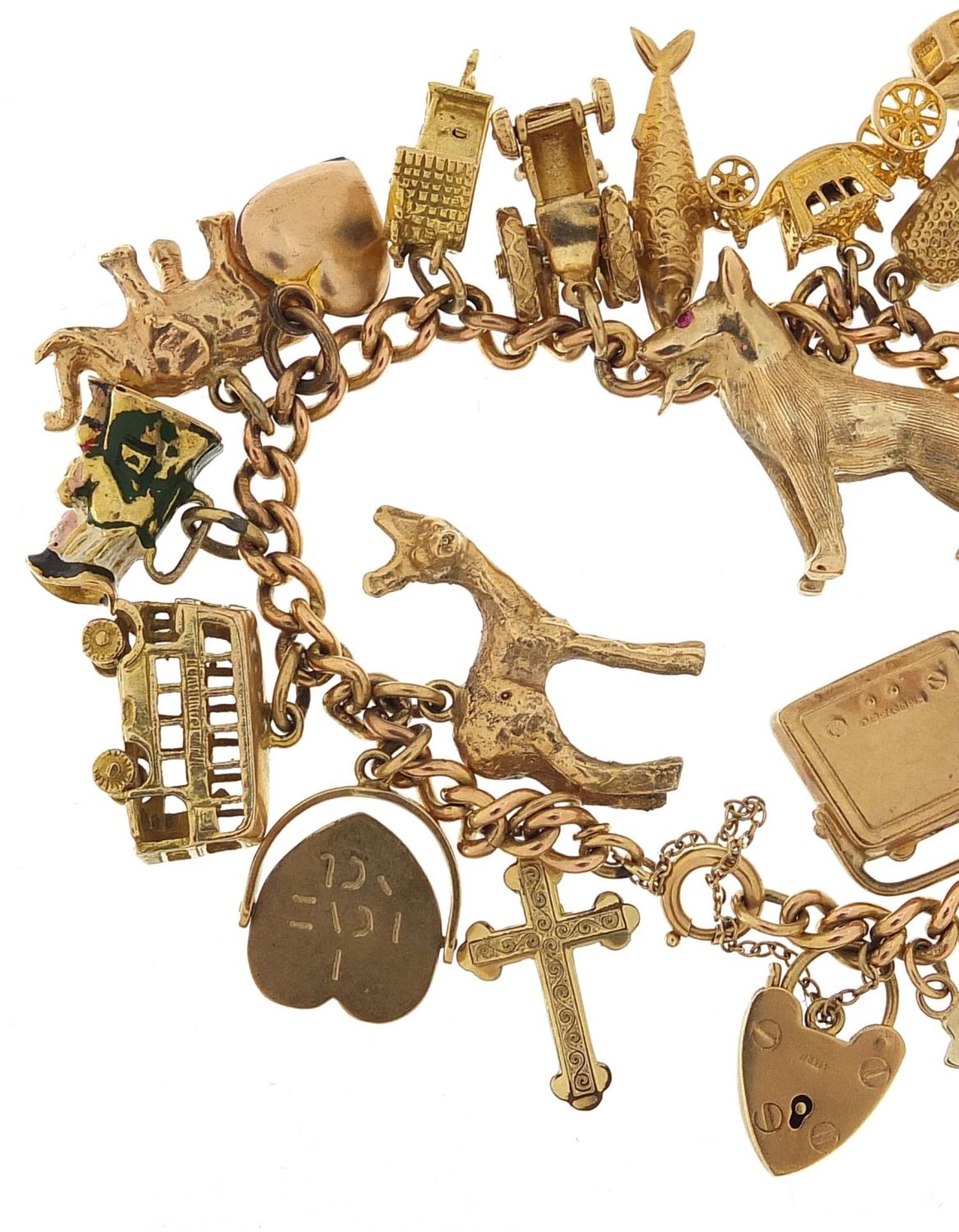 9ct gold charm bracelet with a large selection of mostly 9ct gold charms including Alsatian dog, - Image 5 of 7