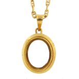 18ct gold pendant on an 18ct gold necklace, 2cm high and 49cm in length, 5.8g - this lot is sold