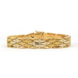 18ct three tone gold bracelet, 20cm in length, 31.4g - this lot is sold without buyer?s premium, the