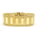 Uno-A-Erre Italian 18ct gold bracelet, 17.5cm in length x 2.2cm wide, 41.6g - this lot is sold