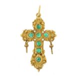 18ct gold cross pendant set with green stones, 3.6cm high, 6.4g - this lot is sold without buyer?s