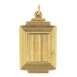 9ct gold engine turned pendant, 3.0cm high, 7.4g - this lot is sold without buyer?s premium, the