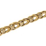 Unmarked two tone gold bracelet, (tests as 18ct gold) 18cm in length, 31.0g - this lot is sold